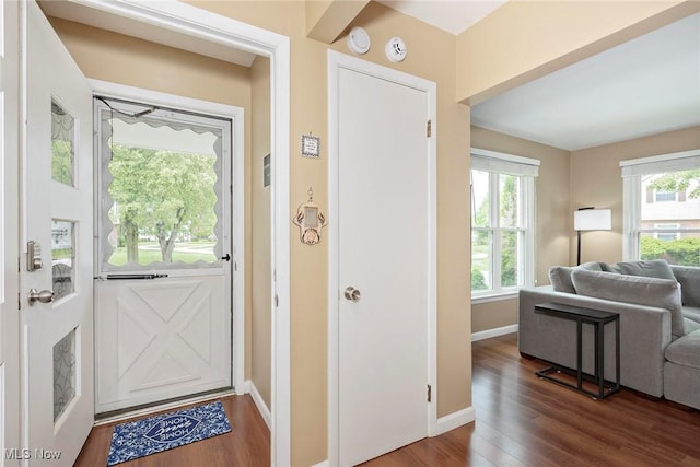 2381 Charney Rd, University Heights, OH 44118 - entrance foyer featuring plenty of natural light, wood finished floors, and baseboards