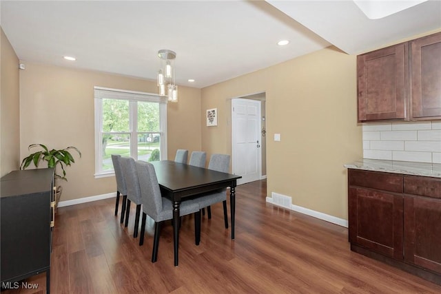 2381 Charney Rd, University Heights, OH 44118 - dining space with dark wood-type flooring, baseboards, and recessed lighting
