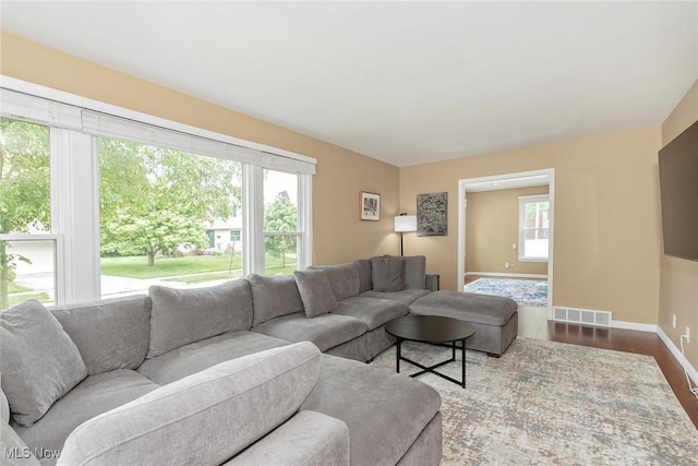 2381 Charney Rd, University Heights, OH 44118 - living area with wood finished floors and baseboards
