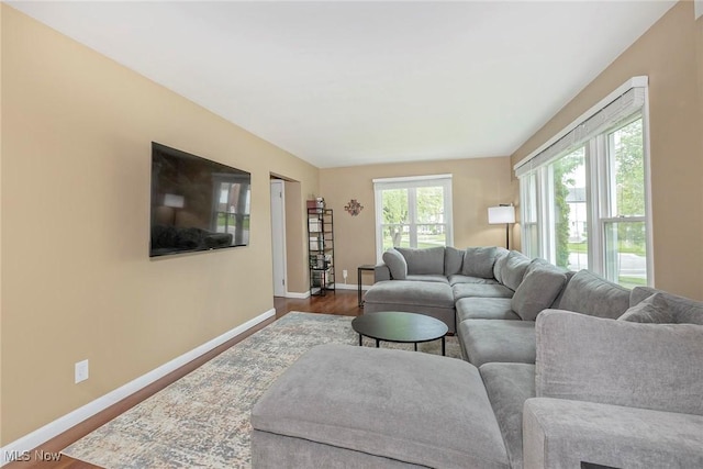 2381 Charney Rd, University Heights, OH 44118 - living area featuring baseboards and wood finished floors