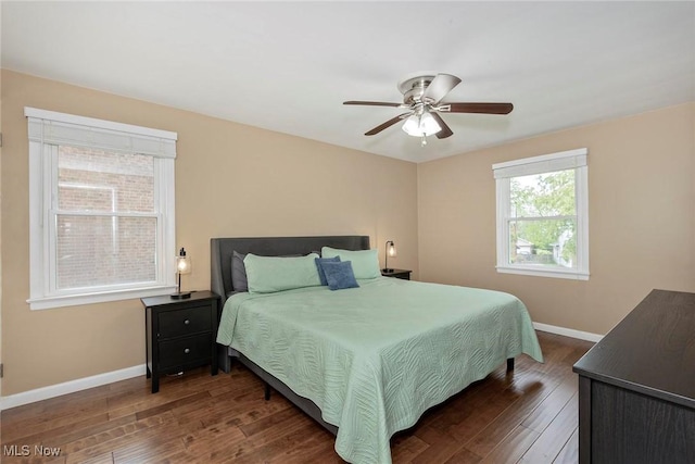2381 Charney Rd, University Heights, OH 44118 - bedroom with baseboards, wood finished floors, and ceiling fan