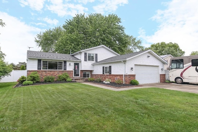 726 N Fork Way, Brunswick Hills, OH 44212 - split level home with brick siding, a garage, and concrete driveway