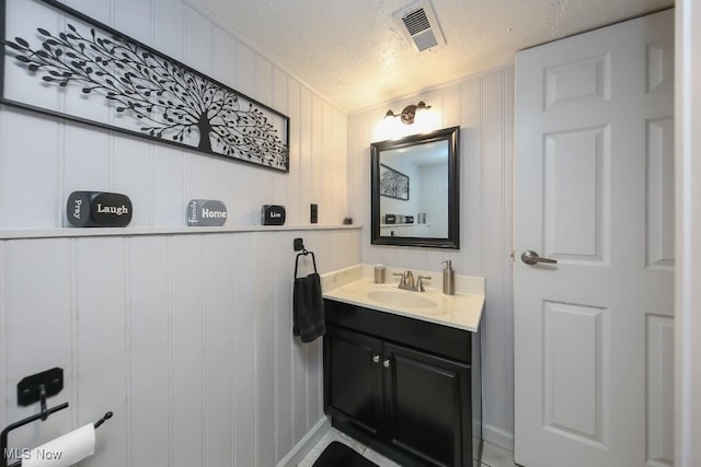 726 N Fork Way, Brunswick Hills, OH 44212 - bathroom with a textured ceiling and vanity