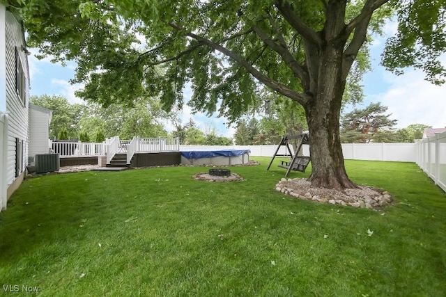 726 N Fork Way, Brunswick Hills, OH 44212 - view of yard with a wooden deck and central air condition unit
