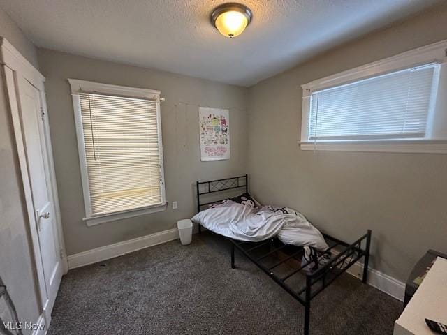 9705 Marah Ave, Cleveland, OH 44104 - bedroom with carpet and baseboards
