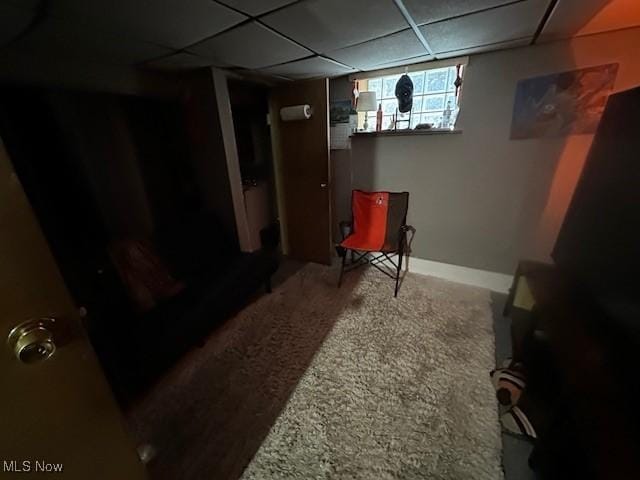 9705 Marah Ave, Cleveland, OH 44104 - below grade area with carpet flooring, baseboards, and a paneled ceiling
