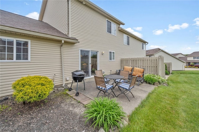 808 Doty Dr, Wadsworth, OH 44281 - back of property featuring a patio and a shingled roof
