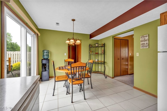 808 Doty Dr, Wadsworth, OH 44281 - dining area featuring a chandelier and baseboards