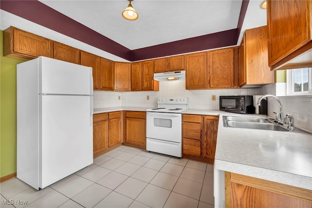 808 Doty Dr, Wadsworth, OH 44281 - kitchen with white appliances, range hood, a sink, brown cabinets, and tasteful backsplash