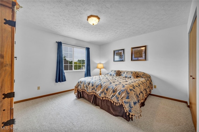 808 Doty Dr, Wadsworth, OH 44281 - carpeted bedroom featuring baseboards and a textured ceiling