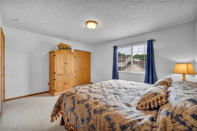 808 Doty Dr, Wadsworth, OH 44281 - carpeted bedroom featuring baseboards and a textured ceiling