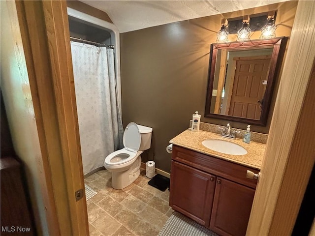 693 Evening Star Ave SE, East Canton, OH 44730 - bathroom with toilet, vanity, and baseboards