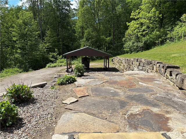 693 Evening Star Ave SE, East Canton, OH 44730 - view of patio / terrace featuring a gazebo and a carport