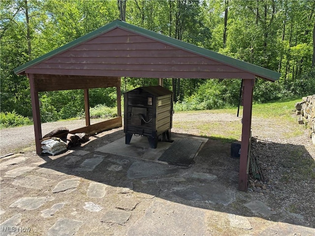 693 Evening Star Ave SE, East Canton, OH 44730 - view of parking with a detached carport