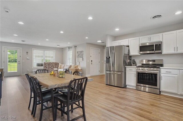 603 S Raccoon Rd Unit 13, Austintown, OH 44515 - dining space featuring light wood-style flooring, recessed lighting, and baseboards