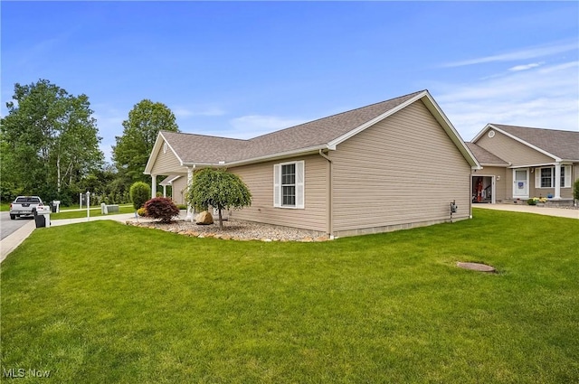 603 S Raccoon Rd Unit 13, Austintown, OH 44515 - view of home's exterior with a yard