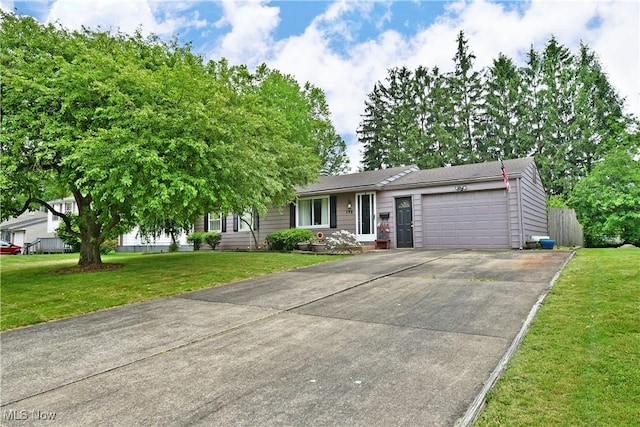 172 Camrose Dr, Niles, OH 44446 - ranch-style house featuring an attached garage, concrete driveway, and a front lawn