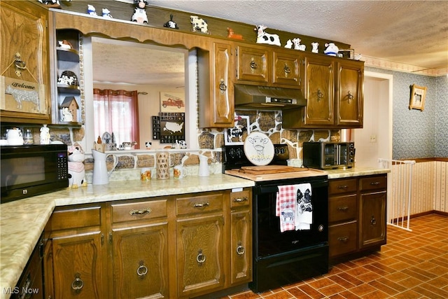 172 Camrose Dr, Niles, OH 44446 - kitchen with range hood, black appliances, wallpapered walls, light countertops, and a textured ceiling