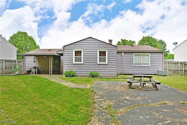 172 Camrose Dr, Niles, OH 44446 - back of property with cooling unit, a chimney, and a patio area