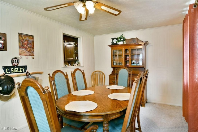 172 Camrose Dr, Niles, OH 44446 - carpeted dining area featuring a ceiling fan and crown molding