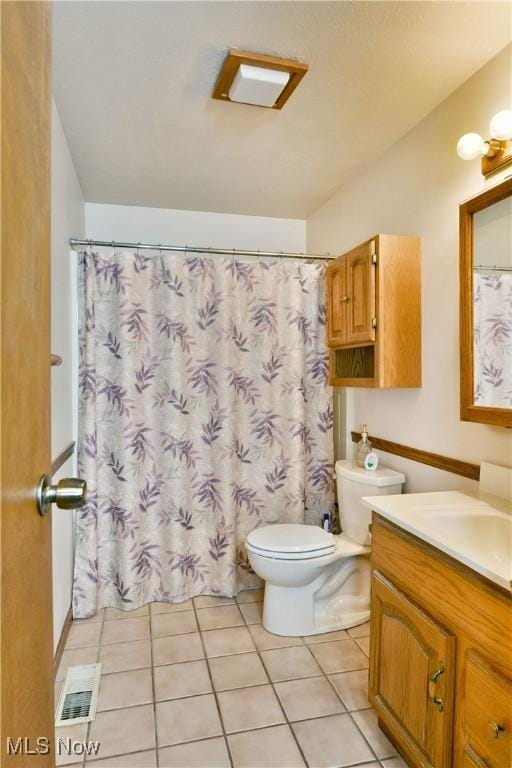 172 Camrose Dr, Niles, OH 44446 - bathroom with vanity, toilet, and tile patterned flooring
