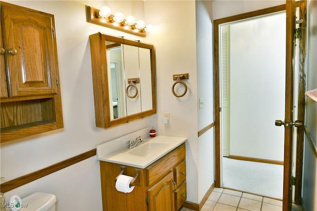 172 Camrose Dr, Niles, OH 44446 - bathroom featuring vanity, toilet, and tile patterned flooring