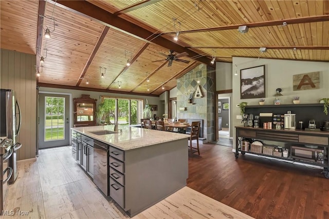 4346 Selhurst Rd, North Olmsted, OH 44070 - kitchen featuring a sink, light wood-style floors, wood ceiling, light stone countertops, and freestanding refrigerator