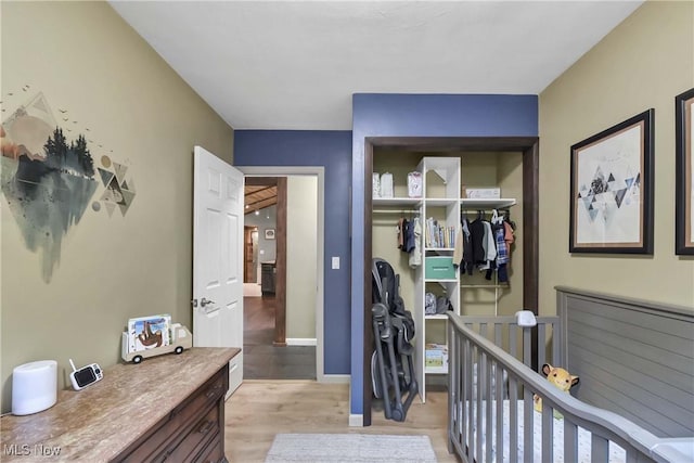4346 Selhurst Rd, North Olmsted, OH 44070 - bedroom with a closet, light wood-type flooring, and baseboards