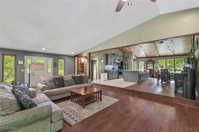 4346 Selhurst Rd, North Olmsted, OH 44070 - living room with vaulted ceiling, wood finished floors, a ceiling fan, and recessed lighting