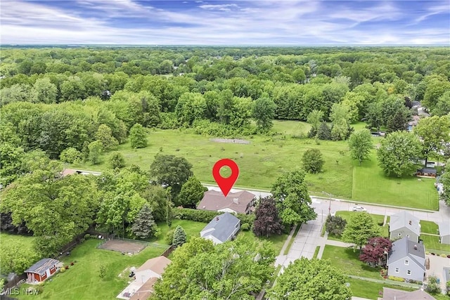 4346 Selhurst Rd, North Olmsted, OH 44070 - aerial view of property and surrounding area featuring a heavily wooded area and nearby suburban area