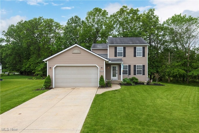 6252 W Breezeway Dr, North Ridgeville, OH 44039 - view of front of property with a front lawn, concrete driveway, and a garage