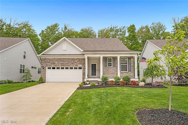 7834 Hunting Lake Dr, Concord, OH 44077 - view of front of house with brick siding, an attached garage, driveway, and a front lawn