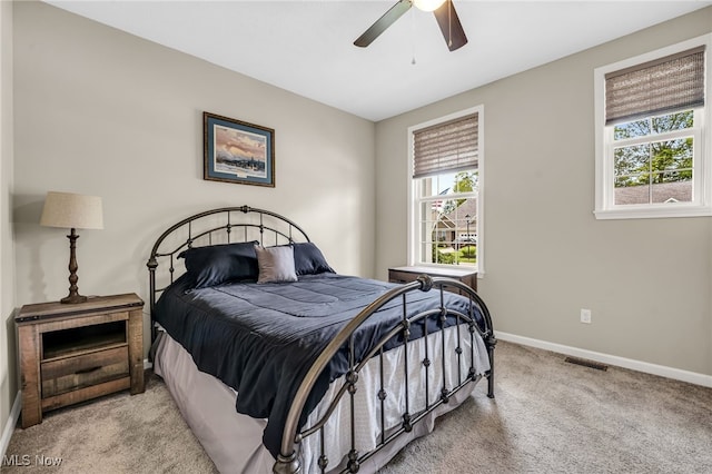 7834 Hunting Lake Dr, Concord, OH 44077 - bedroom with carpet, baseboards, and ceiling fan