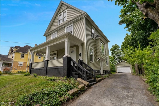 16 Eleanor Ave, Youngstown, OH 44509 - traditional style home with a detached garage, an outdoor structure, covered porch, and stairs