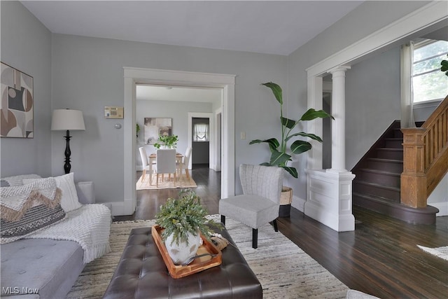16 Eleanor Ave, Youngstown, OH 44509 - living area featuring wood finished floors, stairs, and decorative columns