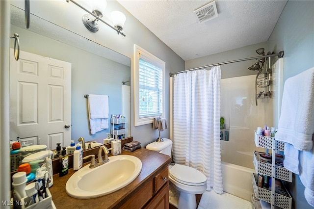 8041 Daisy Hill Ct, Concord, OH 44077 - full bathroom featuring vanity, shower / bath combo, toilet, and a textured ceiling
