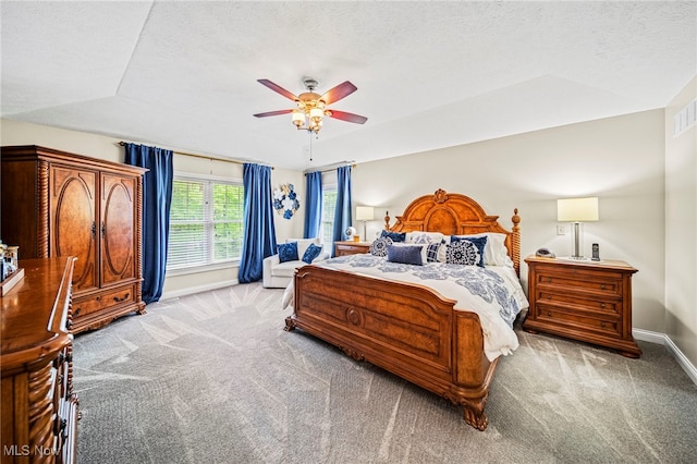8041 Daisy Hill Ct, Concord, OH 44077 - carpeted bedroom with baseboards, a textured ceiling, and ceiling fan