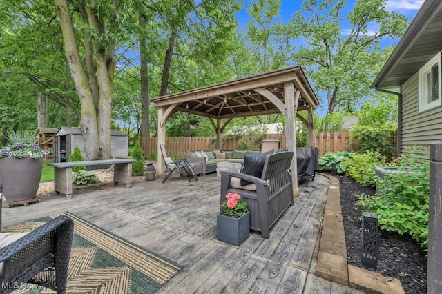 6254 Mackenzie Rd, North Olmsted, OH 44070 - deck with an outdoor living space, a gazebo, and a fenced backyard