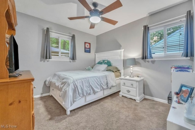 6254 Mackenzie Rd, North Olmsted, OH 44070 - bedroom with baseboards, light colored carpet, and a ceiling fan