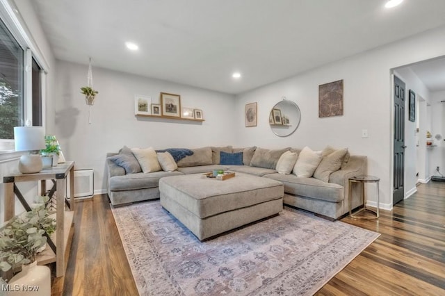 6254 Mackenzie Rd, North Olmsted, OH 44070 - living area with wood finished floors, recessed lighting, and baseboards