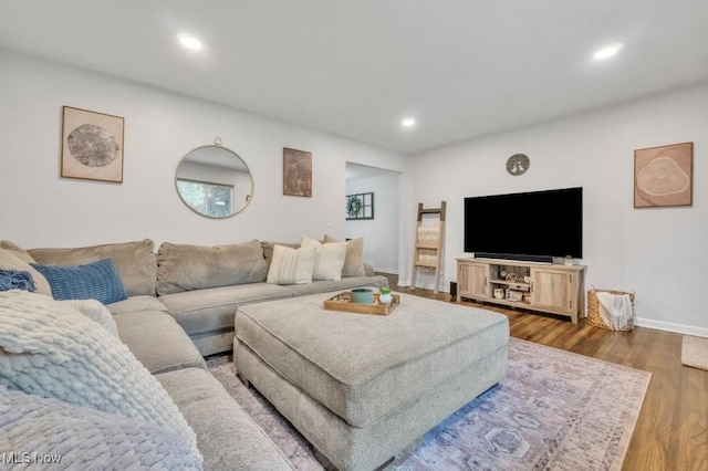 6254 Mackenzie Rd, North Olmsted, OH 44070 - living area featuring recessed lighting, baseboards, and wood finished floors