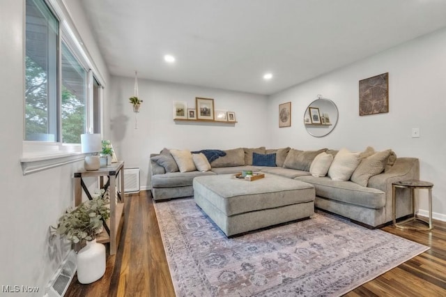 6254 Mackenzie Rd, North Olmsted, OH 44070 - living room with dark wood-style flooring, baseboards, and recessed lighting