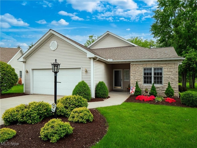 4278 Fall Lake Dr, Avon, OH 44011 - ranch-style home with an attached garage, driveway, a shingled roof, a front yard, and stone siding