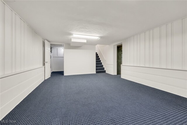 2524 Claver Rd, University Heights, OH 44118 - finished below grade area with dark colored carpet, stairs, and baseboards