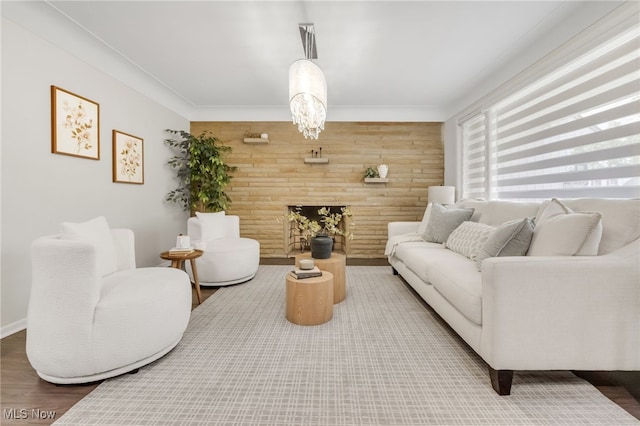2524 Claver Rd, University Heights, OH 44118 - living area featuring wooden walls, wood finished floors, and baseboards