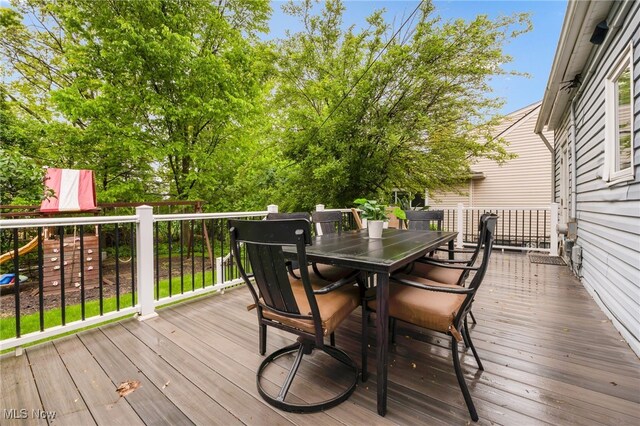 2524 Claver Rd, University Heights, OH 44118 - wooden deck featuring outdoor dining area