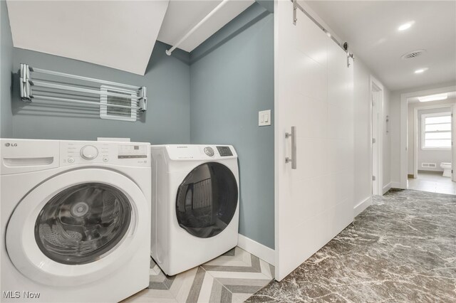 2524 Claver Rd, University Heights, OH 44118 - laundry room featuring washer and clothes dryer, baseboards, and recessed lighting