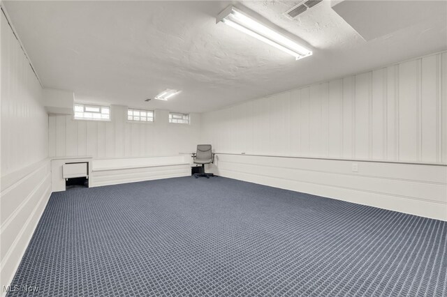 2524 Claver Rd, University Heights, OH 44118 - basement featuring carpet flooring and a decorative wall