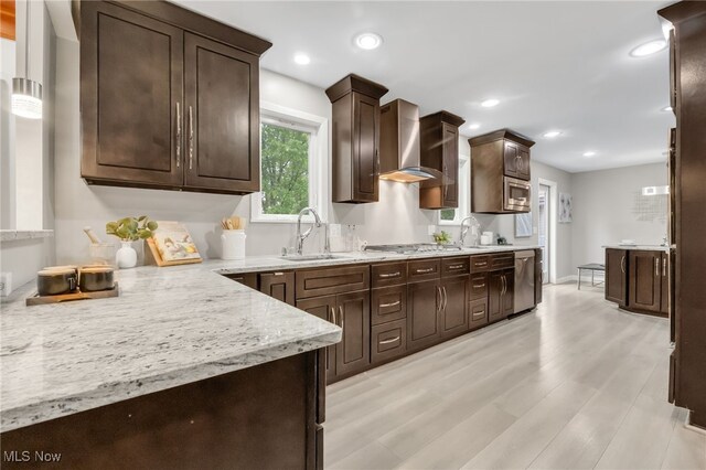 2524 Claver Rd, University Heights, OH 44118 - kitchen with a sink, stainless steel appliances, wall chimney exhaust hood, dark brown cabinets, and recessed lighting