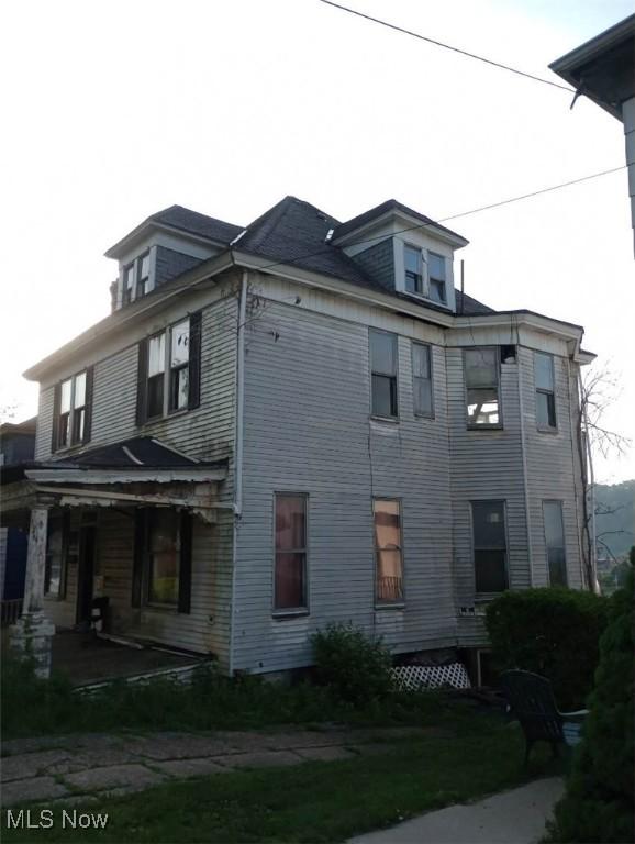 424 Elm St, Martins Ferry, OH 43935 - view of property exterior featuring a porch